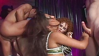 Once the striptease ends the two busty babes begin the anal gangbang with... Big Boobs Porn Video